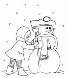 A little girl makes a snowman